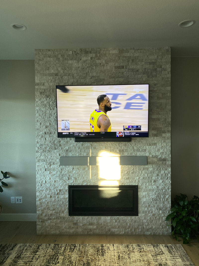 A fireplace media wall installation