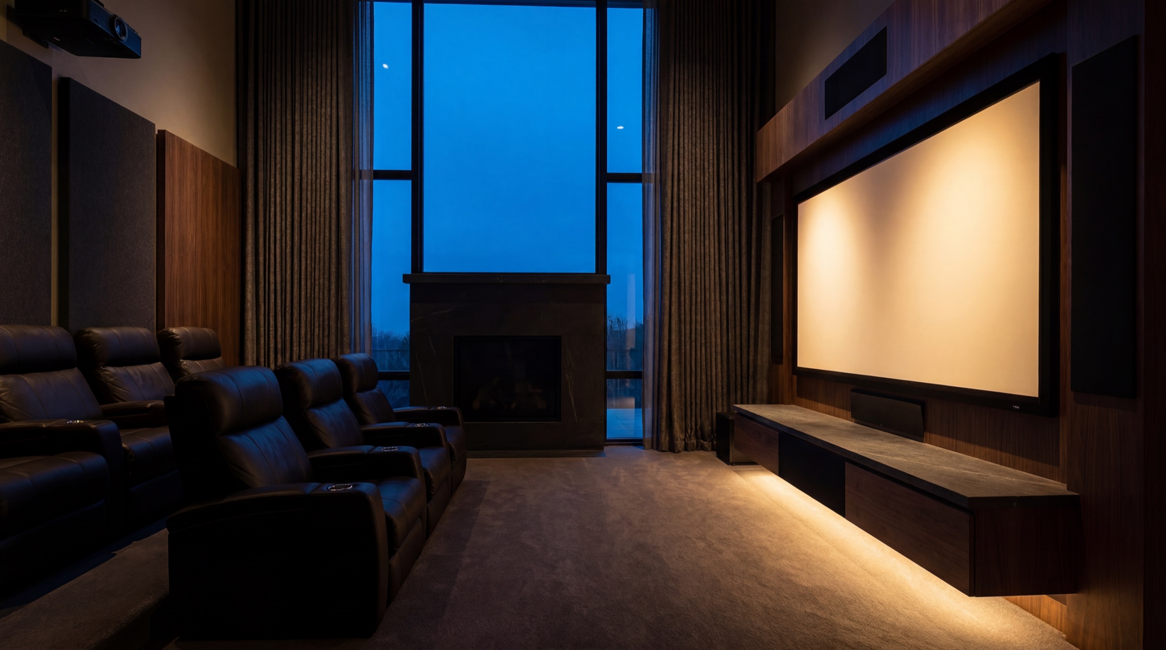 A great room media wall lit at dusk